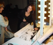 Signing a poster for Toni Winten